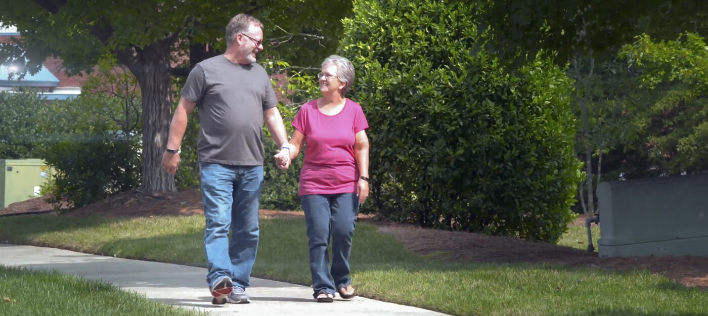 Patient walking with wife after ankle surgery