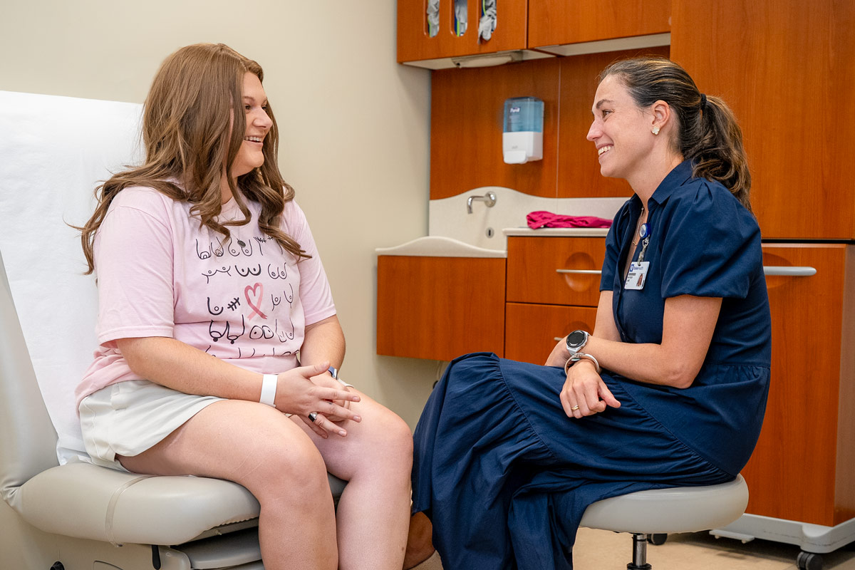 Geason meets with plastic and reconstructive surgeon, Whitney Lane, MD, during a follow-up visit post mastectomy and reconstruction. 