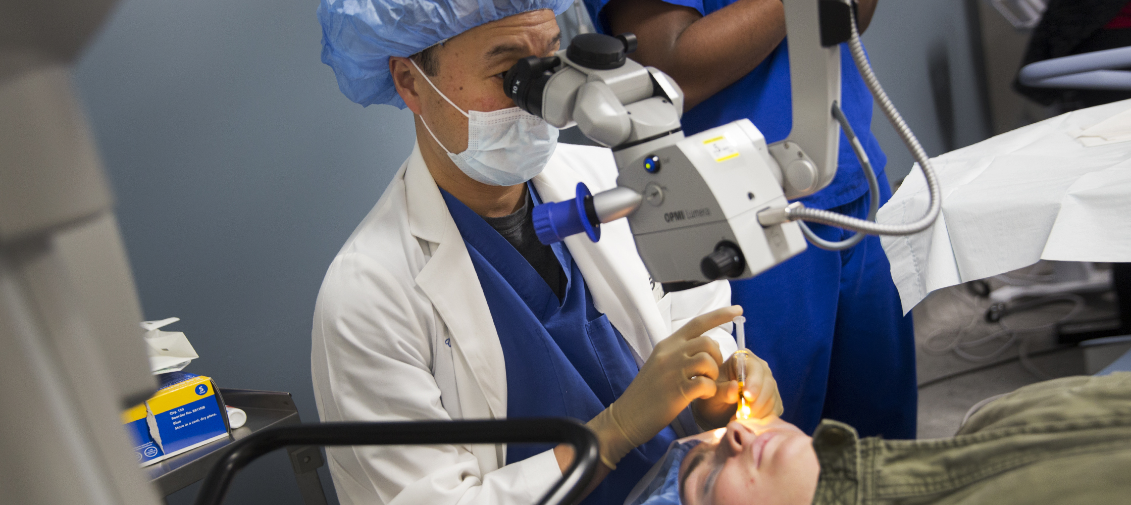 Duke corneal specialist Terry Kim, MD, administers collagen cross-linking treatment