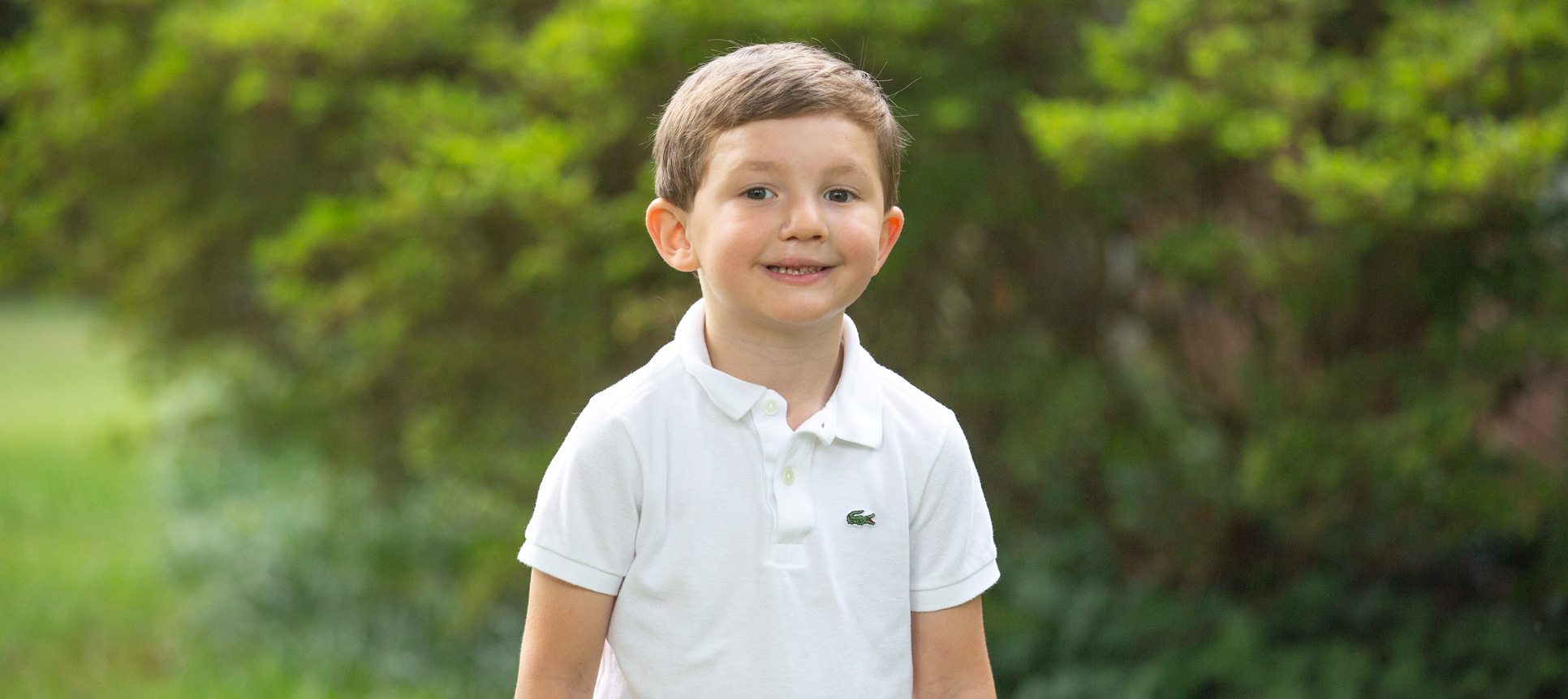 A patient smiles outside his home
