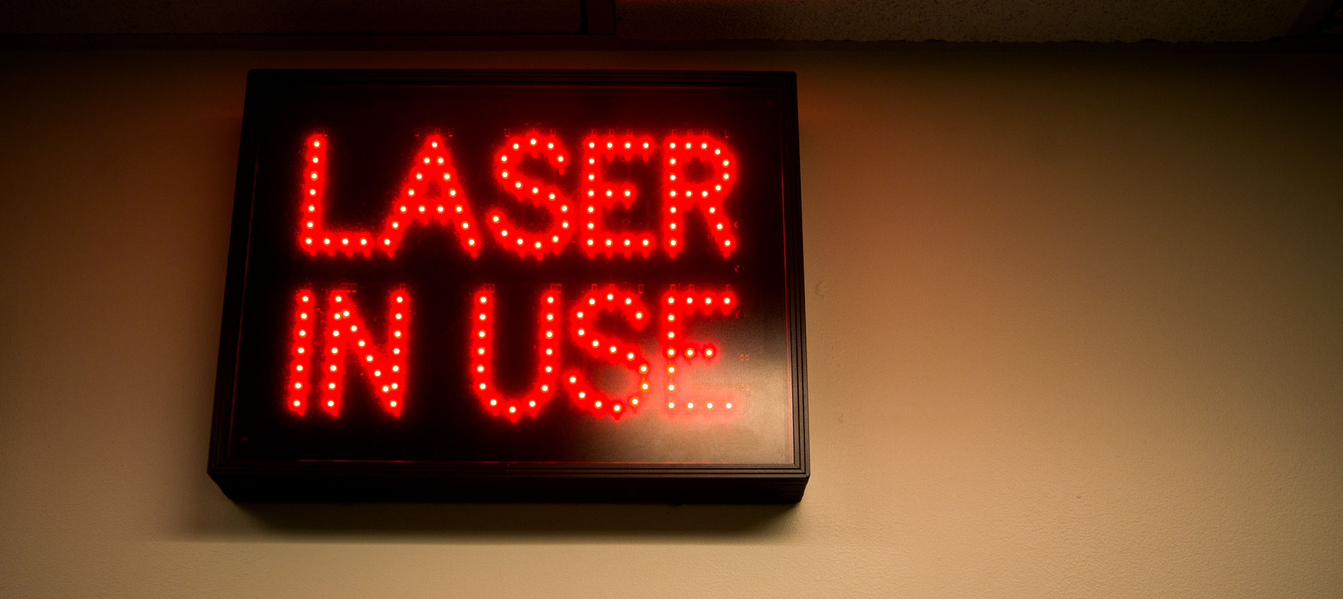 A "Laser in Use" sign lights up