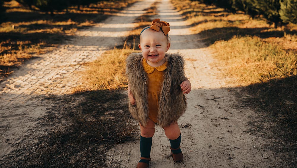 Smiling young girl. Photo by Bri Stidham Photography.