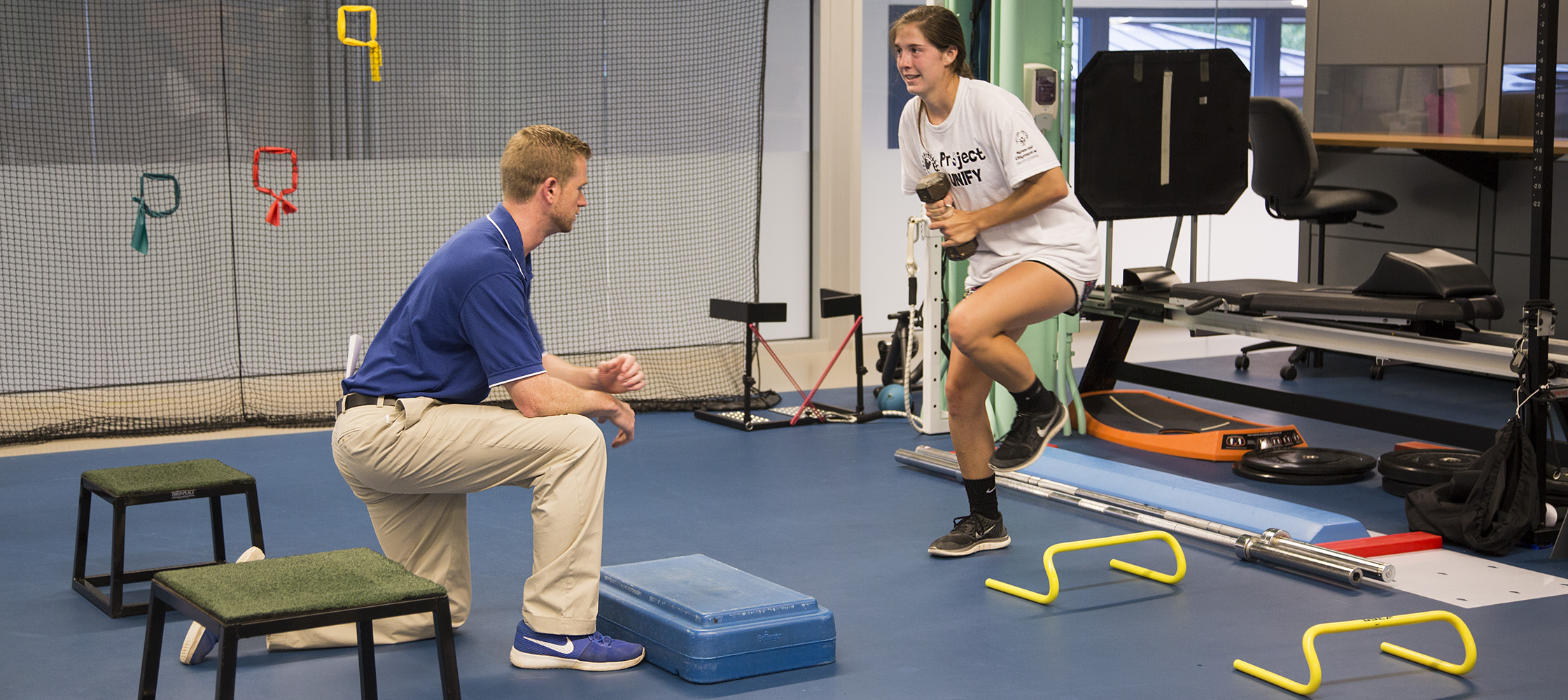 Jesse von Arx works with Duke physical therapist Patrick Chasse. 