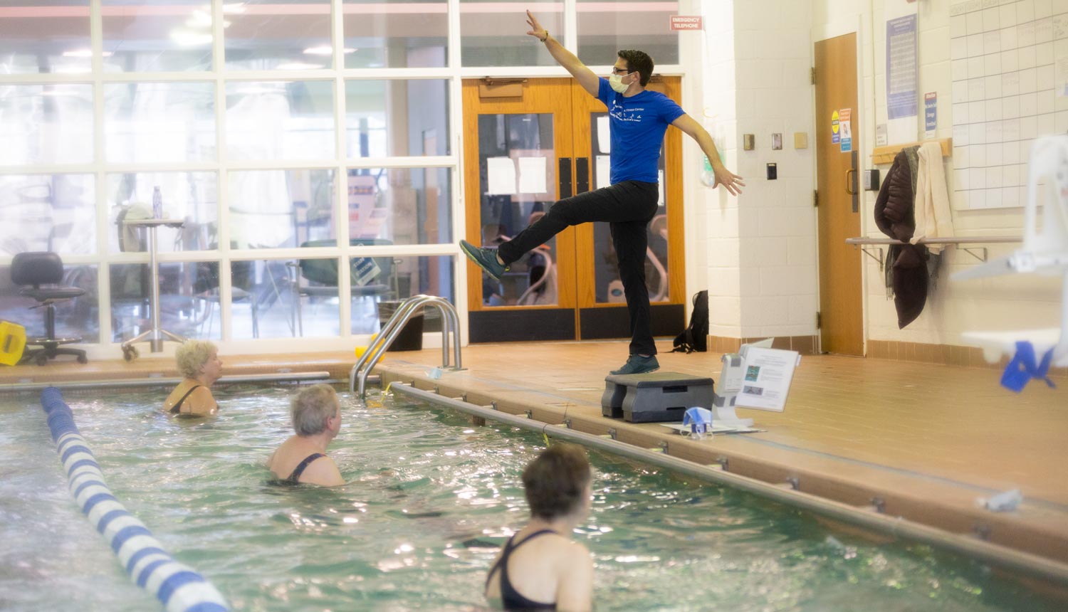 A water exercise class in a pool at the Duke Health &amp; Fitness Center.