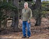 Mickey Whyte stands on his property in Siler City, NC.