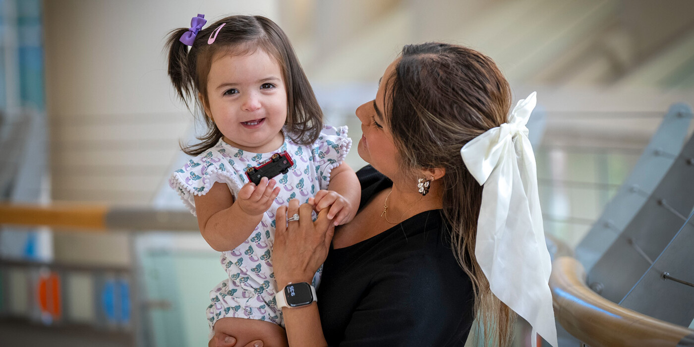 Louisa Scott holds her daughter, Zoey, before an appointment at The Duke Children's Health Center.