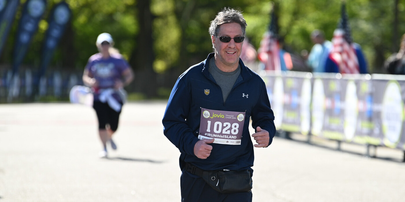 Gary Klausner heads towards the finish line of a 10k race in Long Island, NY. 