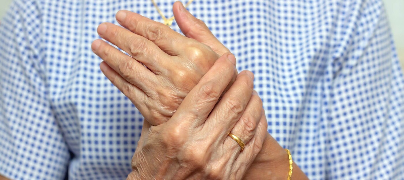 A closeup of an older woman's hands