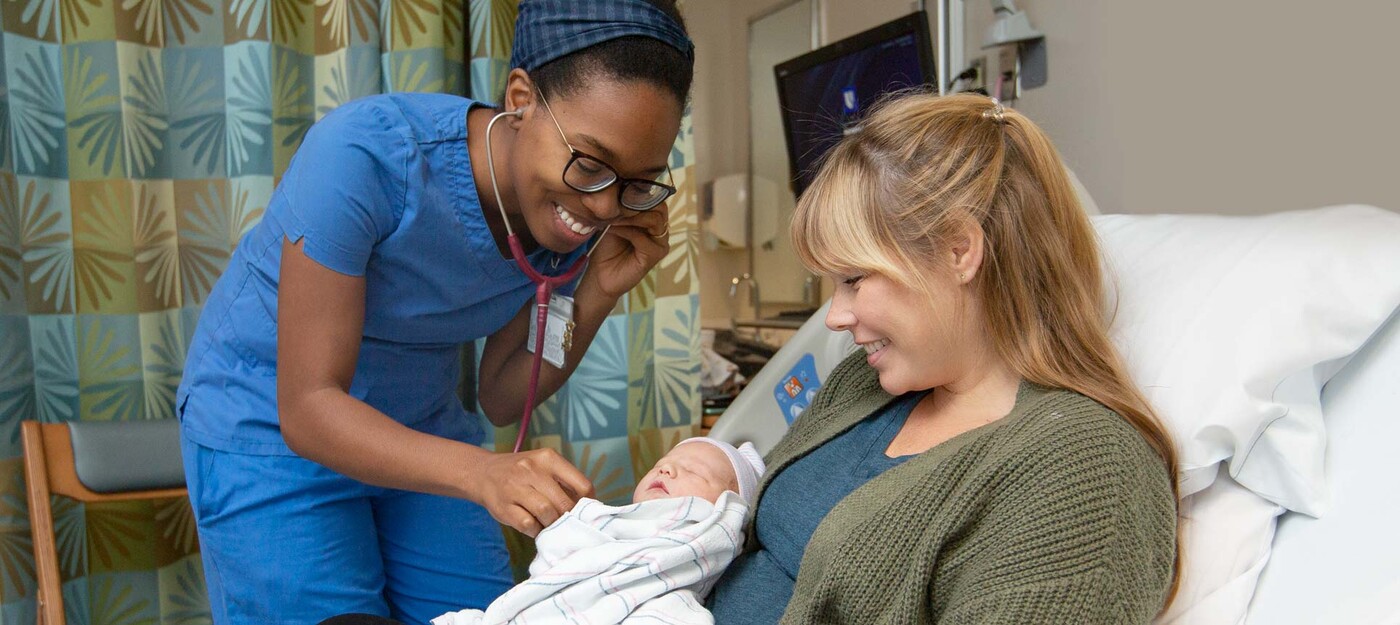 Nurse and new mom with baby at Duke hospital