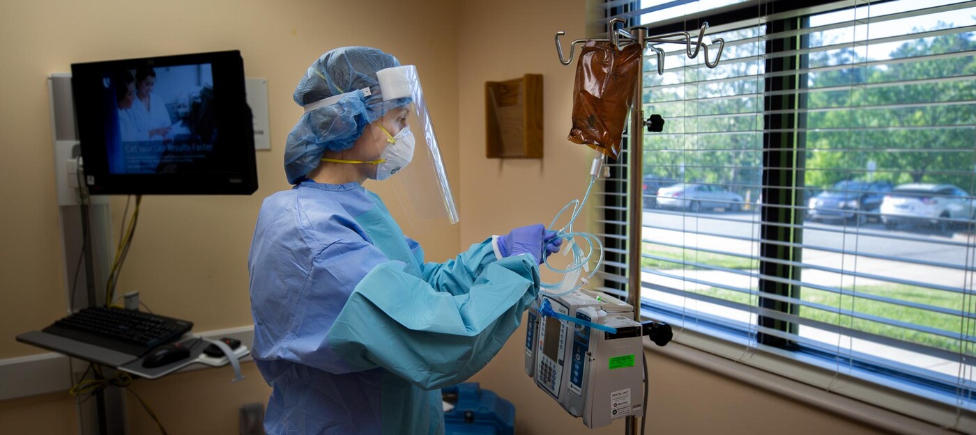 A provider prepares an infusion