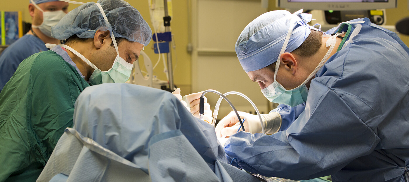 Duke doctors perform thyroid surgery on a patient at Duke Raleigh Hospital.