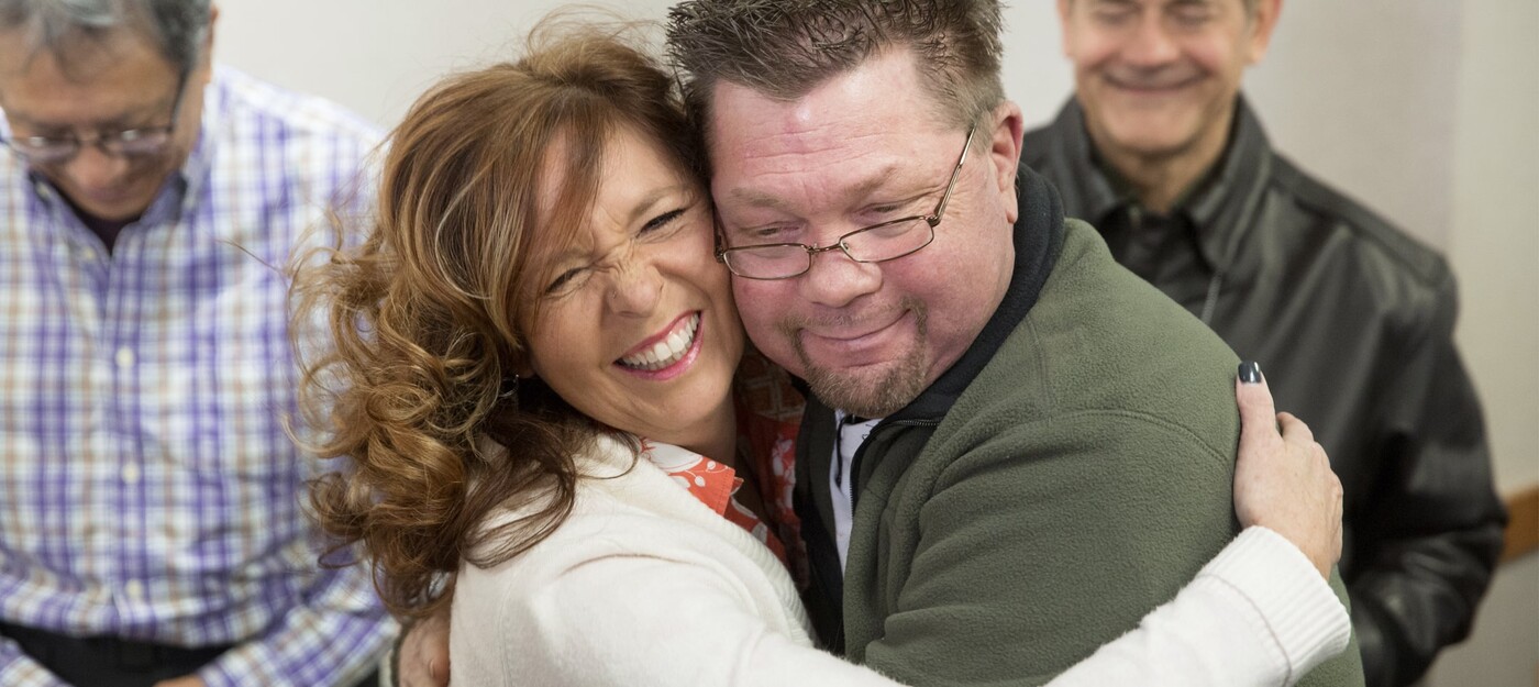 Kidney donor LaDonna Hernandez hugs Brent Pope, a stranger who received her kidney.