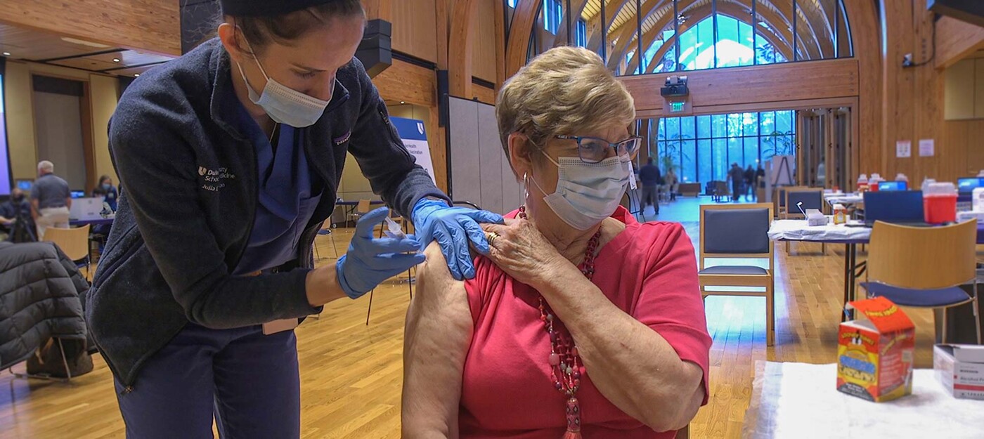 A patient gets the COVID-19 vaccination