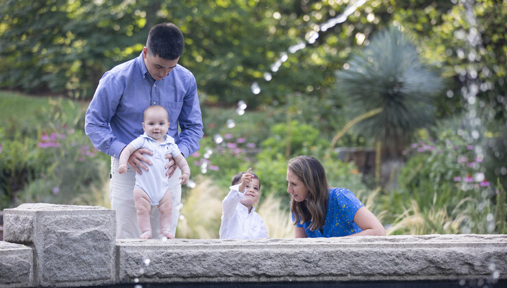 Zarzour family watches a fountain at Sarah P. Duke Gardens.